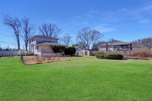 view of yard with fence