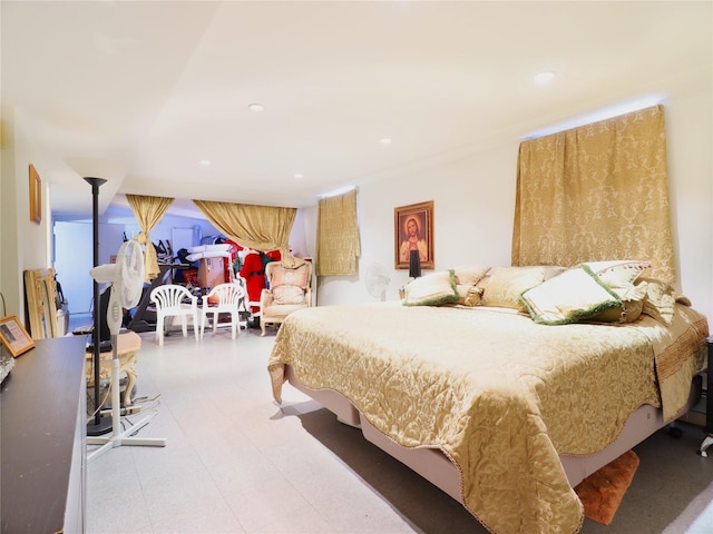 bedroom with tile patterned floors and recessed lighting