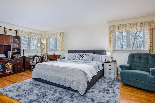 bedroom with wood finished floors