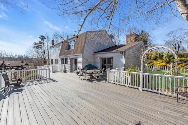 1380 Jackson Lndg, Mattituck, NY 11952 - wooden deck with outdoor dining area