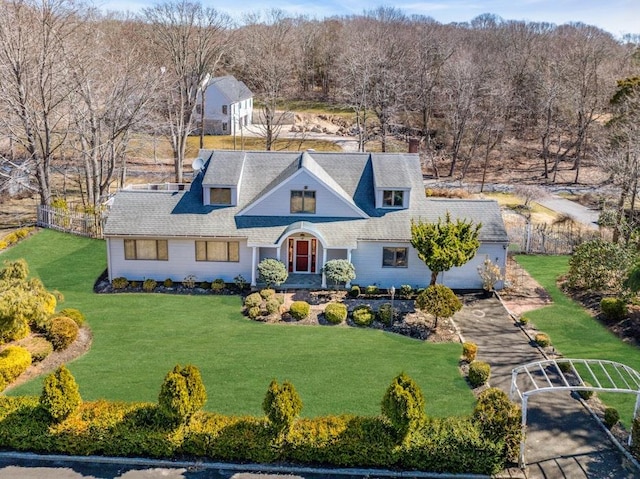 1380 Jackson Lndg, Mattituck, NY 11952 - view of front facade with a garage, driveway, a front yard, and fence