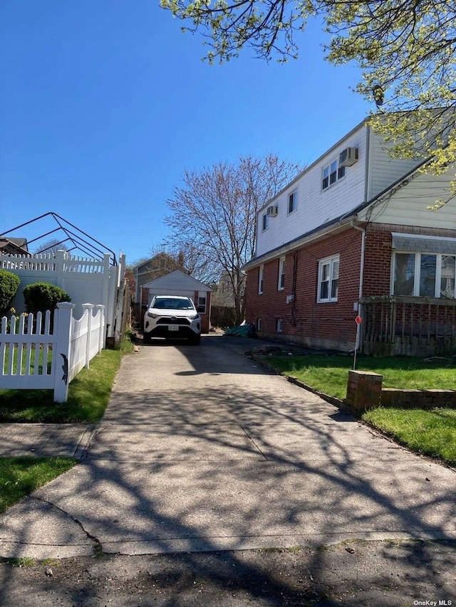 view of road featuring aphalt driveway