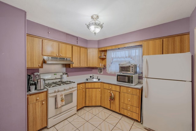 kitchen with a sink, under cabinet range hood, light countertops, white appliances, and open shelves