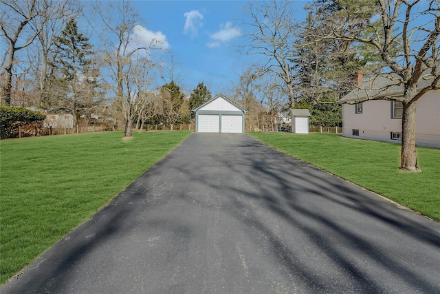 view of street with aphalt driveway