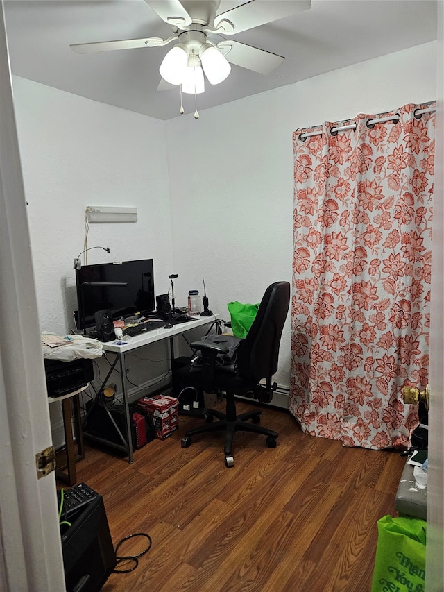 office area with wood finished floors and ceiling fan