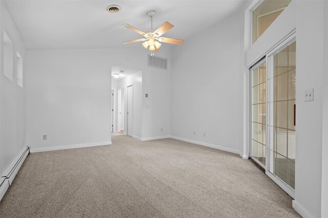 carpeted spare room with a baseboard radiator, lofted ceiling, ceiling fan, and baseboards