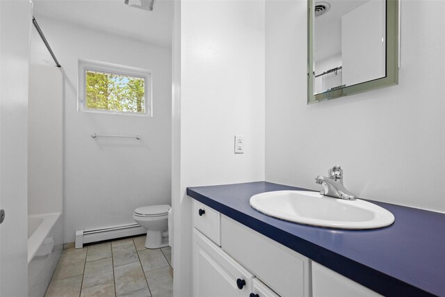 bathroom featuring a baseboard radiator, toilet, vanity, tile patterned floors, and shower / bath combination
