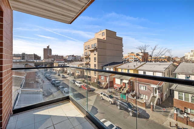 balcony featuring a city view