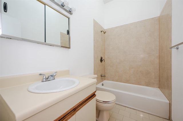 bathroom featuring tile patterned floors, shower / washtub combination, toilet, and vanity