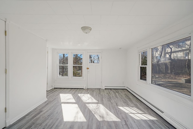 interior space featuring baseboard heating