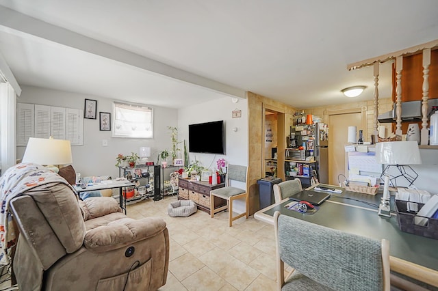 living area with light tile patterned floors