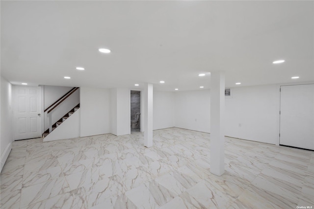 finished below grade area with recessed lighting, stairway, marble finish floor, and visible vents