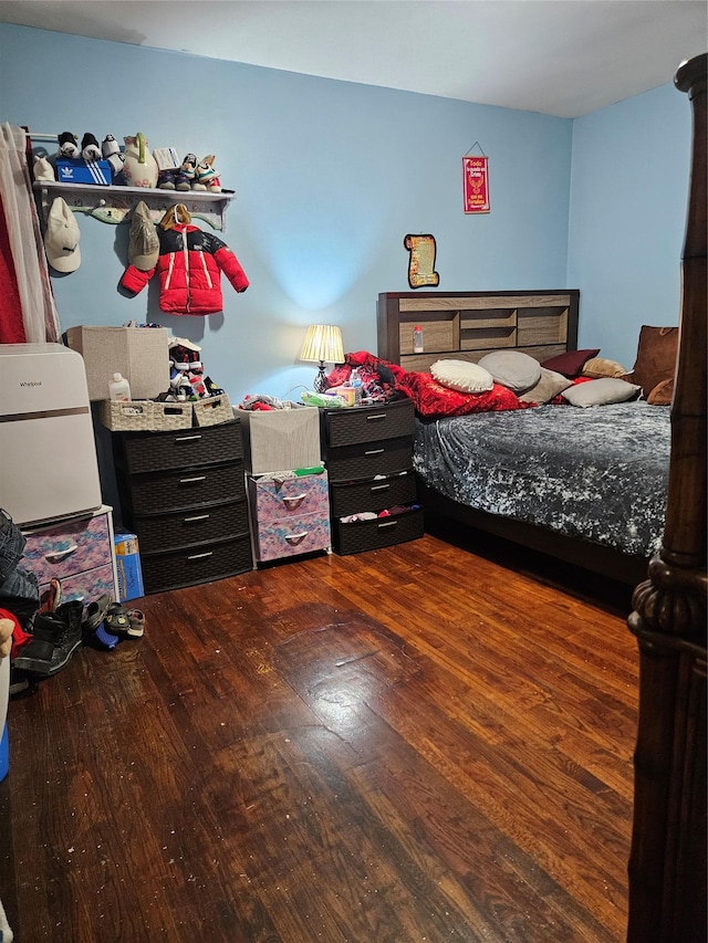 bedroom featuring hardwood / wood-style floors