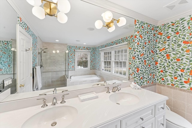 full bath with wallpapered walls, crown molding, a tile shower, and a sink