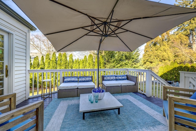 wooden deck featuring outdoor lounge area