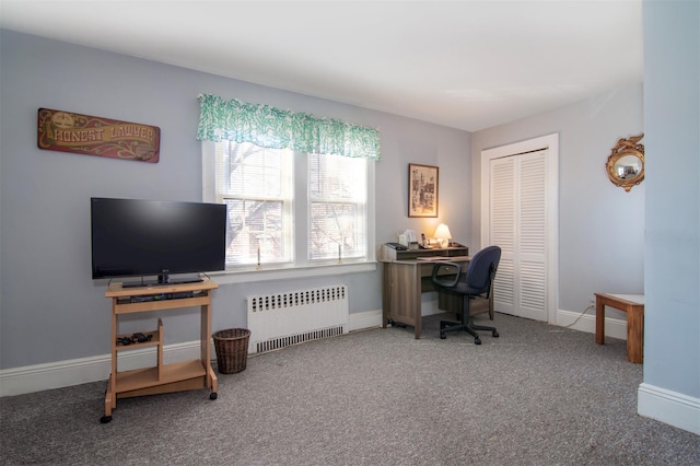 office with radiator, baseboards, and carpet floors