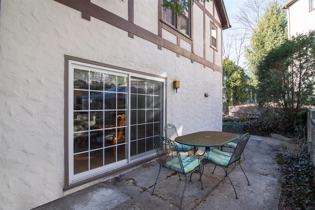 view of patio featuring outdoor dining space