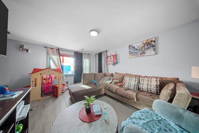 living room with wood tiled floor