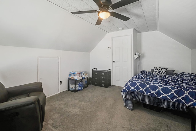 bedroom with a ceiling fan, carpet, and vaulted ceiling