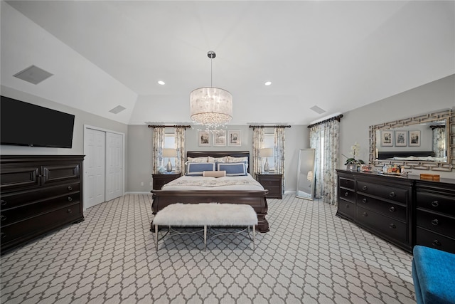 bedroom with vaulted ceiling, light colored carpet, visible vents, and baseboards