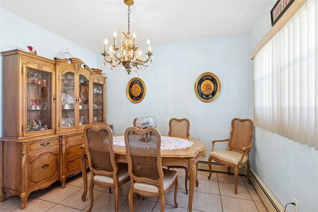 dining area featuring an inviting chandelier, light tile patterned flooring, and baseboard heating