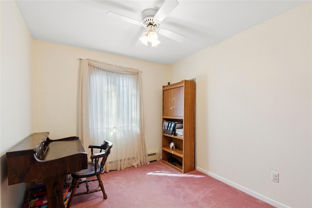 carpeted office featuring baseboards, a baseboard heating unit, and ceiling fan