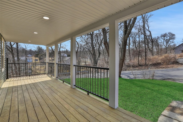 deck featuring a lawn