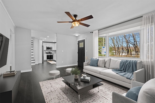 living room featuring stairway, baseboards, recessed lighting, dark wood-style flooring, and ceiling fan