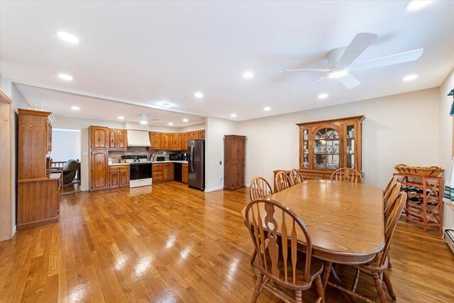 dining area featuring recessed lighting, light wood-type flooring, and a ceiling fan