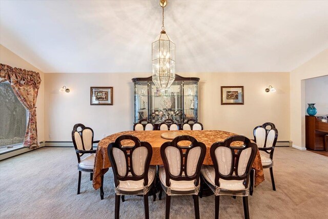 dining space with light carpet, a baseboard heating unit, baseboards, a chandelier, and vaulted ceiling