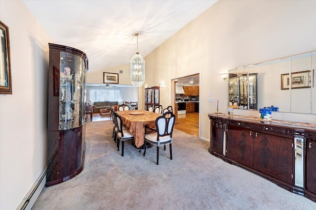 dining area featuring baseboards, high vaulted ceiling, light colored carpet, baseboard heating, and a chandelier