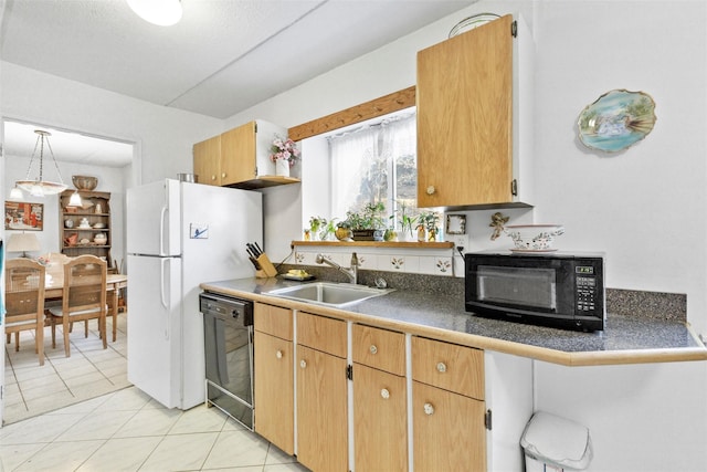 kitchen featuring light tile patterned floors, a sink, pendant lighting, dishwasher, and dark countertops