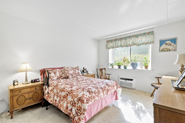 bedroom featuring an AC wall unit and carpet floors