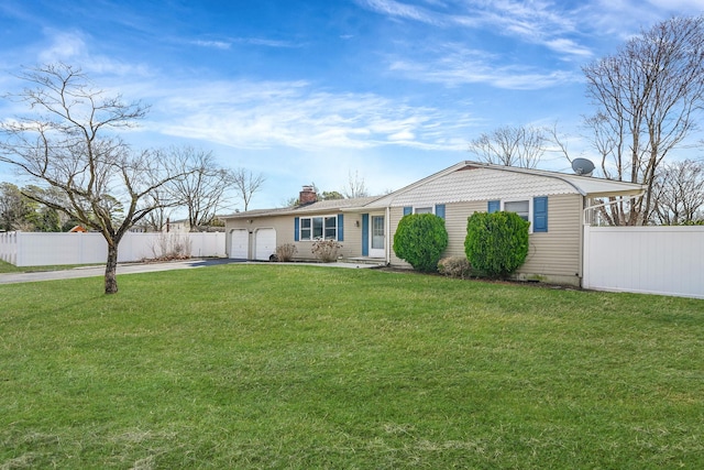 ranch-style home with fence, aphalt driveway, a front yard, a chimney, and a garage