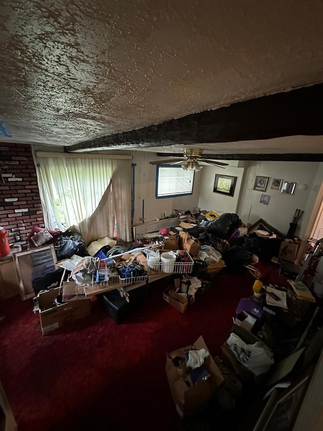 carpeted living area featuring ceiling fan