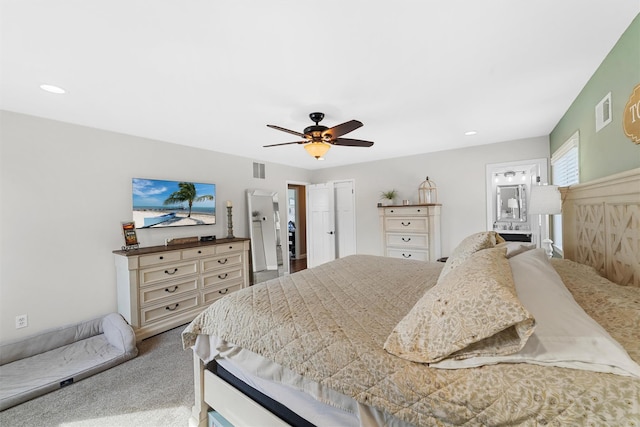 carpeted bedroom with recessed lighting, visible vents, and ceiling fan