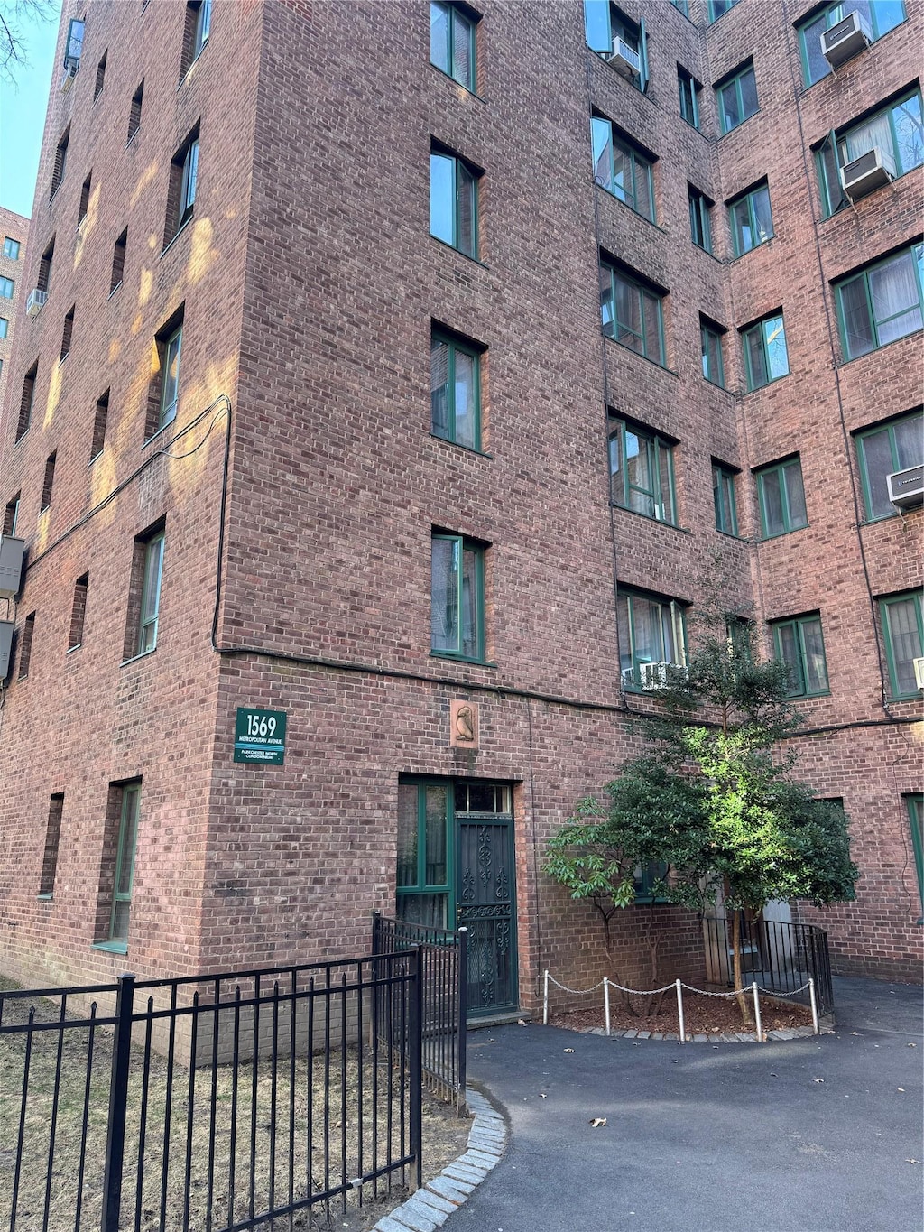 1569 Metropolitan Ave Unit 5G, Bronx, NY 10462 - view of property featuring fence