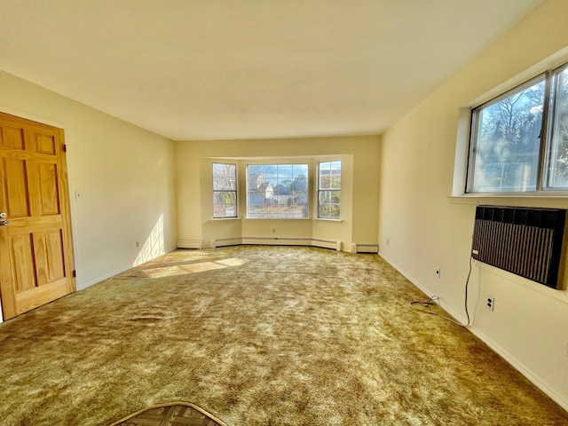 unfurnished room featuring heating unit, baseboards, a baseboard heating unit, and carpet