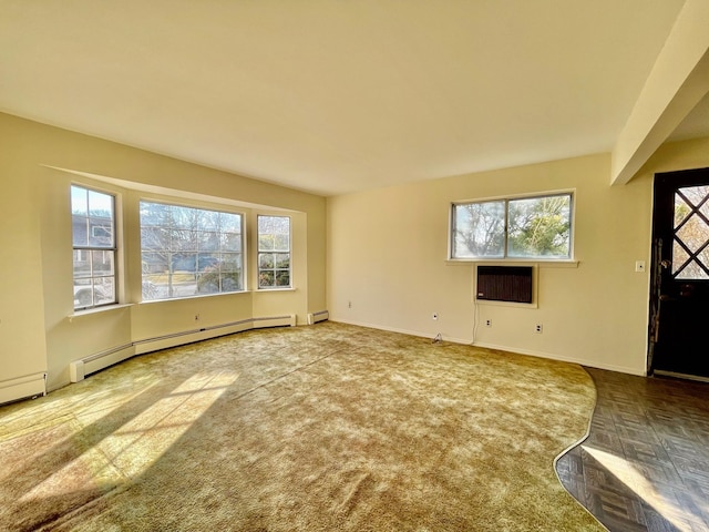 unfurnished living room featuring baseboards and a baseboard radiator