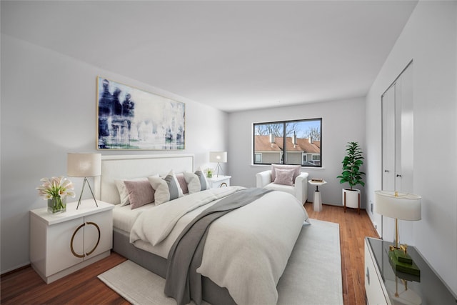 bedroom featuring wood finished floors