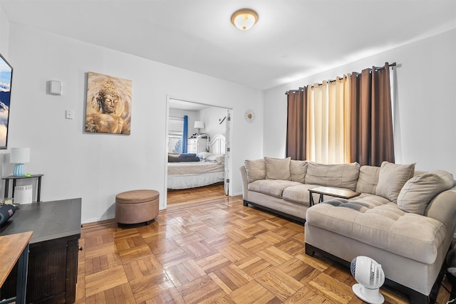 living room featuring baseboards