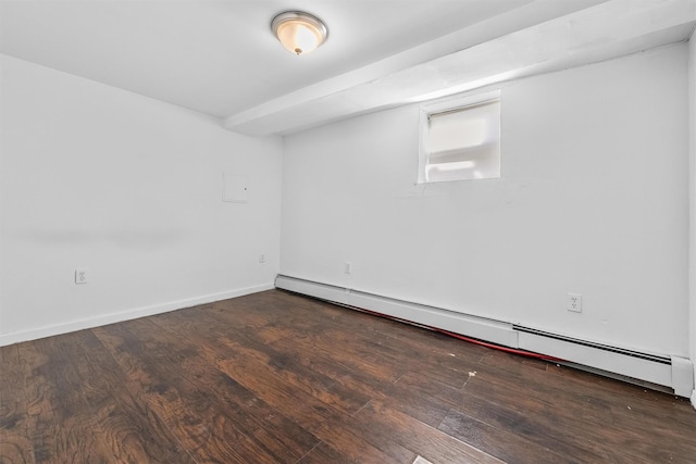 unfurnished room featuring a baseboard heating unit, baseboards, and wood finished floors