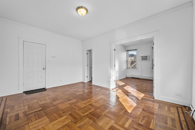 unfurnished room featuring crown molding, baseboards, baseboard heating, and a wall mounted AC