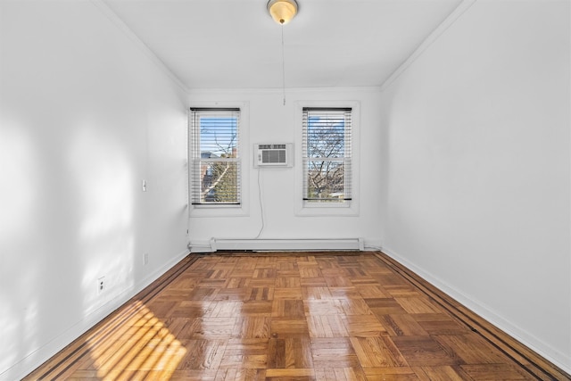 empty room with a wall mounted AC, ornamental molding, baseboards, and a baseboard radiator