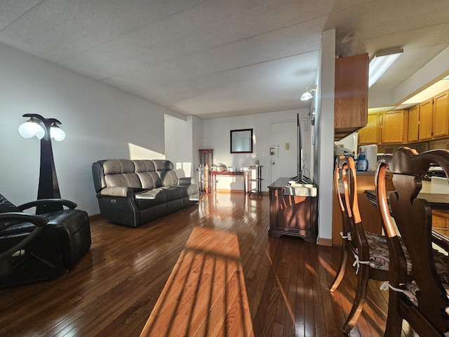 living room with dark wood-style flooring