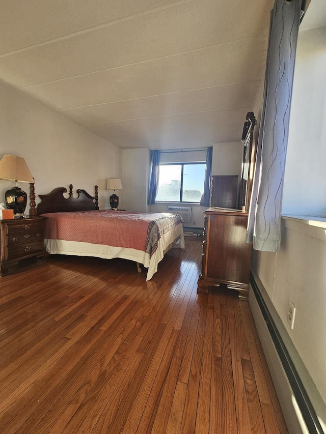 bedroom featuring dark wood-style flooring