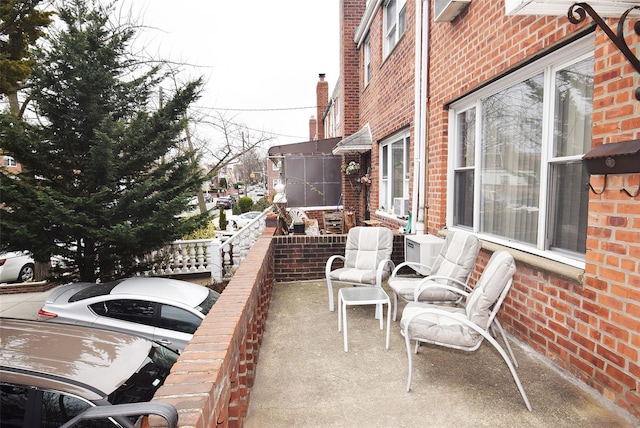 view of patio featuring a grill