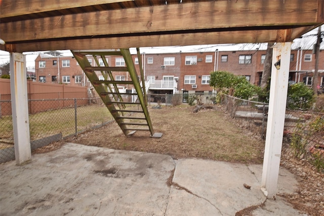 exterior space with stairway and fence