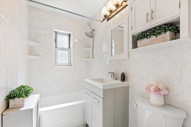 full bath with toilet, vanity, decorative backsplash, shower / bathtub combination, and tile walls