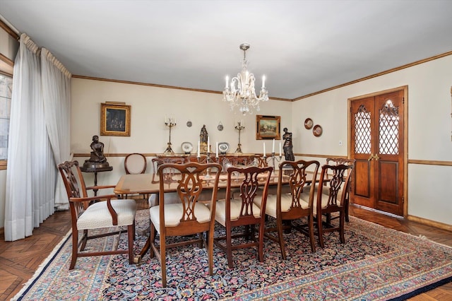 dining room with an inviting chandelier and crown molding